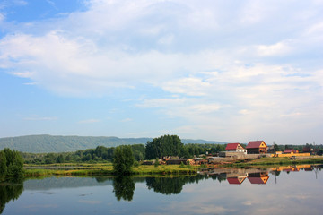 Obraz premium The village by the lake