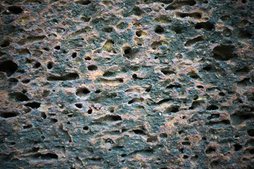 Porous stone surface erosion