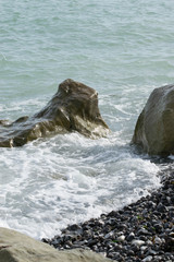 Ocean waves hit the rocks