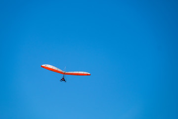 Parachute in blue sky