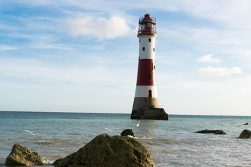 Fototapeta premium Lighthouse in the sea with only one access only while tide off.