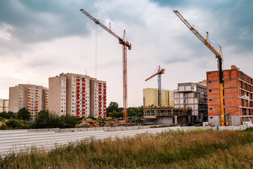 Construction site. Big industrial tower cranes