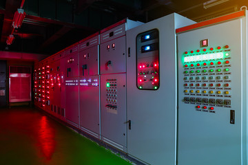 Electrical switch gear at Low Voltage motor control center cabinet  in coal power plant. blurred for background.