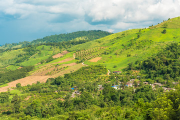 Fototapeta na wymiar View of Chiang Khong district with khong river and Laos border and green mountain and nice sky