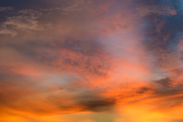 Beautiful twilight sky with orange and blue colour dramatic cloud.