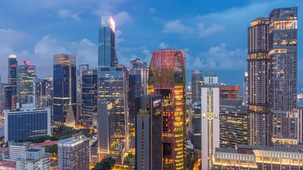 Fototapeta na wymiar Aerial view of Chinatown and Downotwn of Singapore day to night timelapse