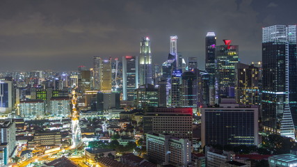 Aerial view of Chinatown and Downotwn of Singapore night timelapse