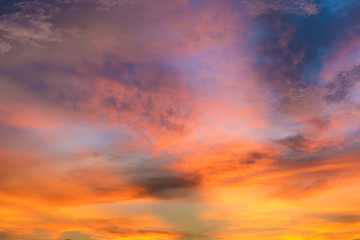 Beautiful twilight sky with orange and blue colour dramatic cloud.