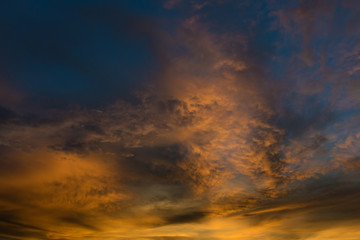 Obraz na płótnie Canvas Beautiful twilight sky with orange and blue colour dramatic cloud.