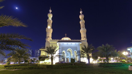 Fototapeta na wymiar Al Noor Mosque in Sharjah at night timelapse hyperlapse. United Arab Emirates