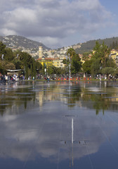 Games of water and reflection on promenade du paillon in nice, france