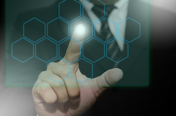 The fingers of the businessmen press of holographic technology