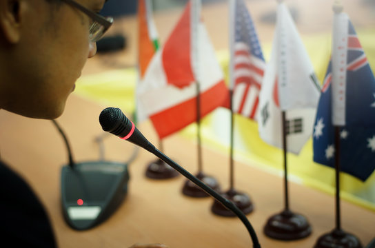 The politician was speaking at the microphone in the conference, the leaders of the major powers - Powered by Adobe