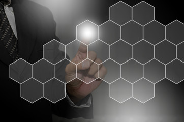 The fingers of the businessmen press of holographic technology