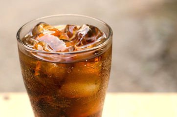 Carbonated water with ice in a glass, drink thirst