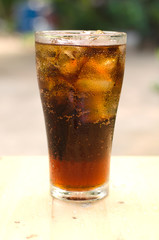 Carbonated water with ice in a glass, drink thirst