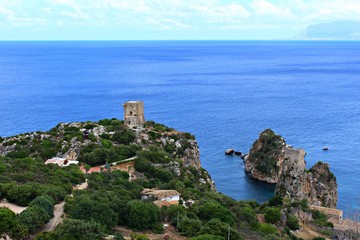 Fototapeta na wymiar Italy, Sicily: Old Doria tower in Scopello bay.