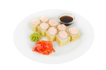 Sushi, rolls, uramaki, Alaska, tempura with lava sauce, tobiko caviar, raw seafood, soy sauce, marinated ginger and wasabi, food on plate, white isolated background Side view For the menu