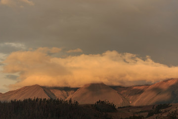 Vulcano in the background of the cityscape of otavalo, ecuador