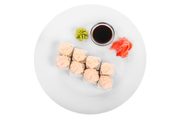 Sushi, rolls, uramaki Alaska, lava sauce, tobiko caviar, raw seafood, soy sauce, marinated ginger and wasabi, food on plate, white isolated background view from above. For the menu, restaurant, cafe