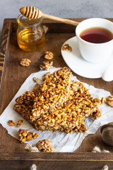 Dessert bars made of walnuts in a honey caramel. Gozinaki - traditional Georgian confection made of...