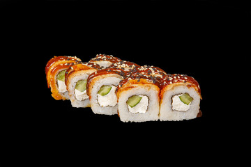Sushi, rolls, uramaki, with eel, cucumber, cheese, sesame and teriyaki sauce, raw seafood, marinated ginger and wasabi, black isolated background Side view For the menu, restaurant bar cafe