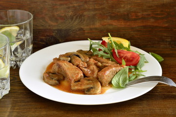 Beef Stroganoff with mushrooms and fresh vegetables