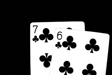 Playing cards on a dark background close up