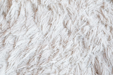 furry white blanket or cloth. textured warm cozy and comfy fabric background. free space concept.