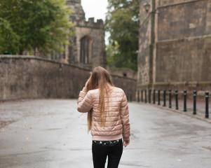 Fototapeta na wymiar Woman walking in England