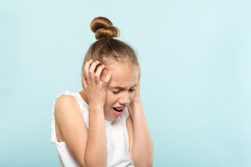 stress and emotional breakdown. feelings expression. frightened and petrified girl clutching head....