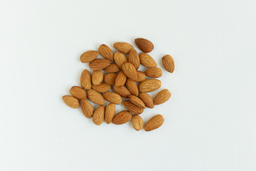 fresh almonds on a white background