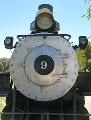 Front view of historic railroad locomotive 9, a 4-6-0 oil fueled steam engine, built in 1909 and used in gold mining days in the Owens Valley in the Eastern Sierra of California.