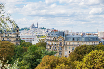 Fototapeta na wymiar Paris skyline with Montmartre hill and Sacre Coeur Basilica in view.