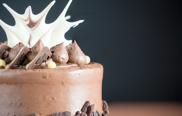 Close up part of Birthday Mini cake in front of a chalkboard.mini cake.chocolate cake for love valentines.