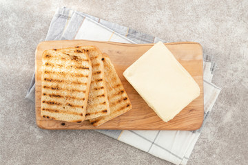 Toast and butter for breakfast. Top view