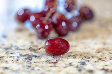 Red Grapes On Granite Counter Top
