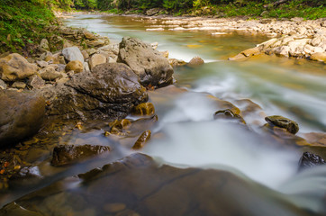 The waterfall on the long exposure in the Carpathian Mountain