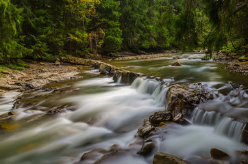 Obraz premium The waterfall on the long exposure in the Carpathian Mountain