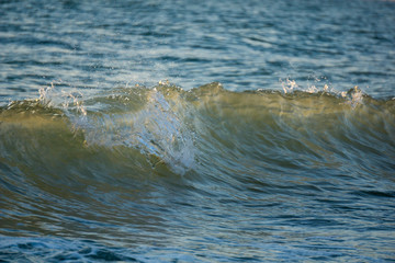 Small and peacefull waves hitting the shore
