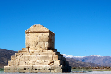 The UNESCO-listed Tomb of Cyrus the Great at Pasargadae near Persepolis in the Fars region of Iran, with snow-capped mountains in the background