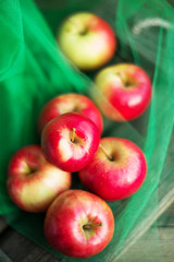 a group of red garden fresh apples on wooden background natural concept for fresh natural food and vitamins