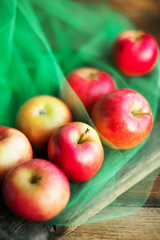 a group of red garden fresh apples on wooden background natural concept for fresh natural food and vitamins