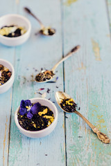 Flower tea: edible Pansy flowers, lemongrass, lavender, rose. Tea with flower petals.