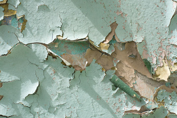 Close-up detail of cracked paint on wall.