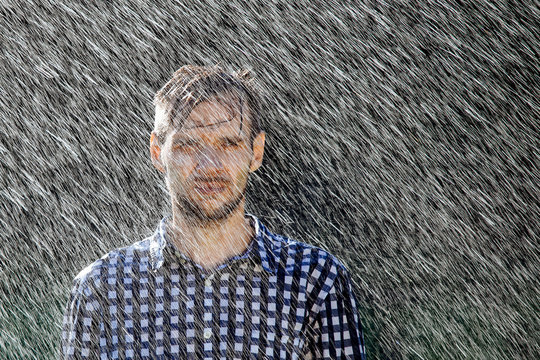 man wet under rain farmer hat enjoy prayer happy upset heavy wet water shower sun summer pray