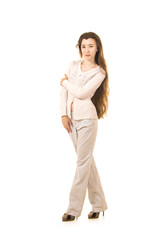 Emotions of a beautiful girl with long hair, in a white jacket posing in Studio on a white background.