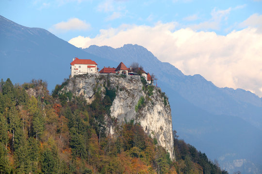 Medieval Bled Castle on the cliff above Lake Bled. Lake Bled is a popular travel destination in Slovenia.
