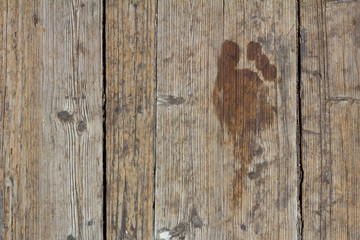 Footprint on the wooden floor