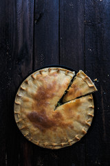 Obraz na płótnie Canvas Greek Pie Spanakopita with Spinach and Cheese, top view, copy space.